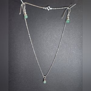 Sterling silver necklace with pendent and matching earrings